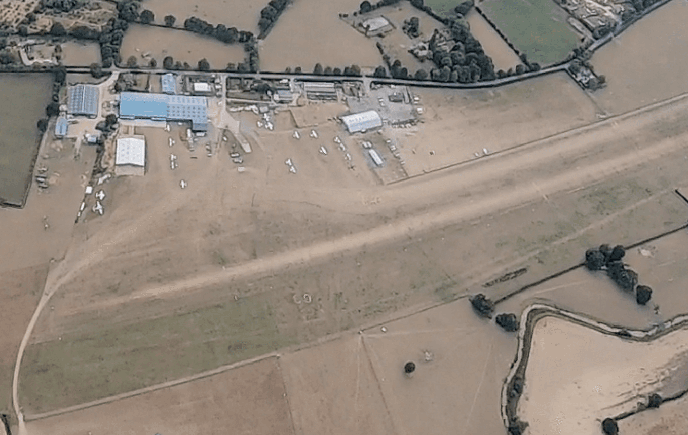 Group of skydivers in freefall formation
